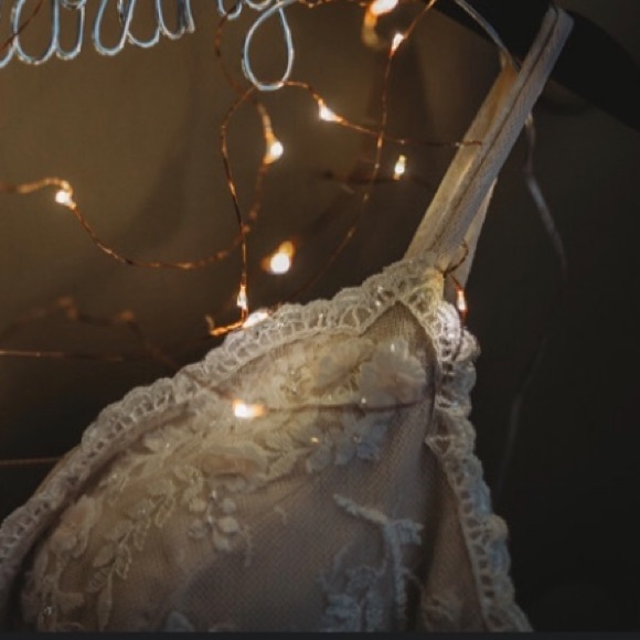 A-line, ivory lace bridal gown with blush flower detailing. size 10🤍 - Picture 10 of 10